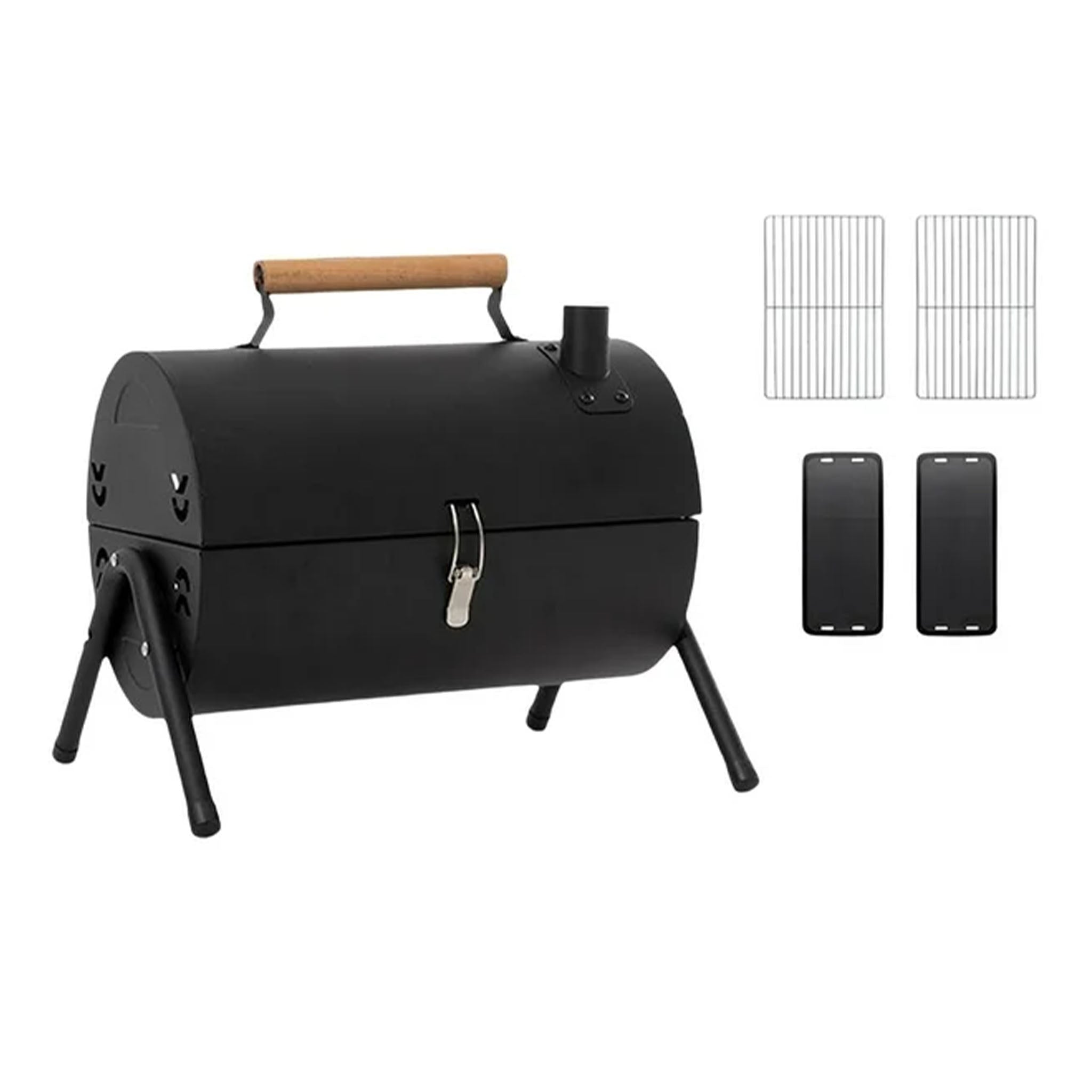 Black barbecue grill with accessories on a white background
