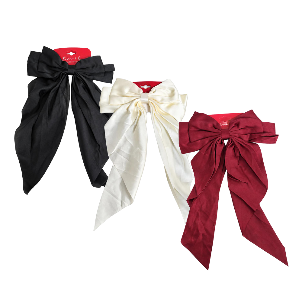 Three satin bow hair accessories in black, cream, and burgundy, each attached to a red plastic display card, shown against a plain white background.
