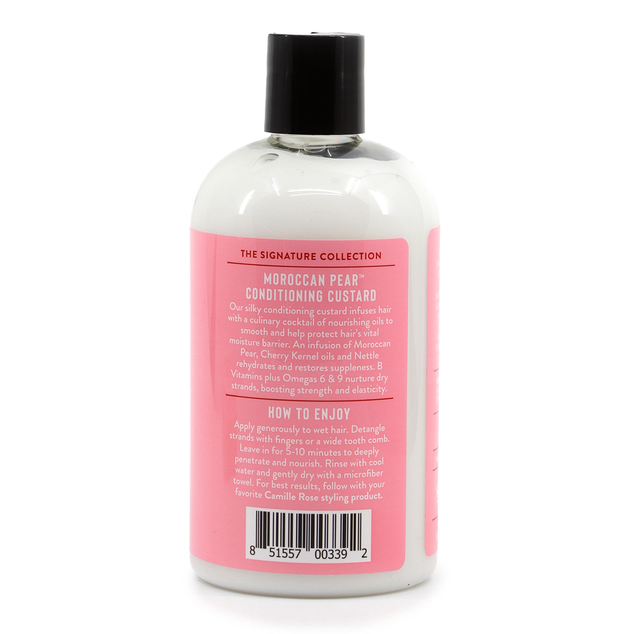 Bottle of Moroccan Pear Conditioning Custard with pink label on a white background