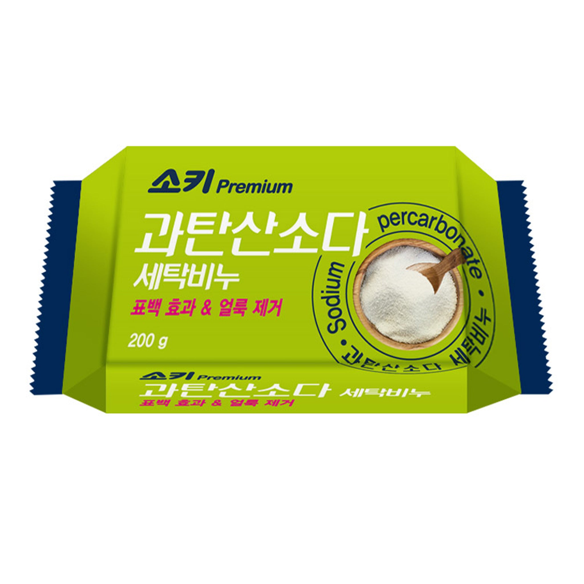Green packaging of a soap bar with text and a spoonful of soap on a white background