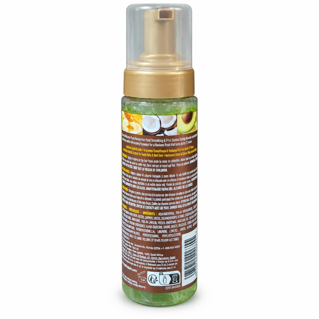 A bottle of Coconut & Avocado Hair Smoothing & Shine Foam on a plain white background, showing the back of the bottle with its label, barcode, and pump dispenser.