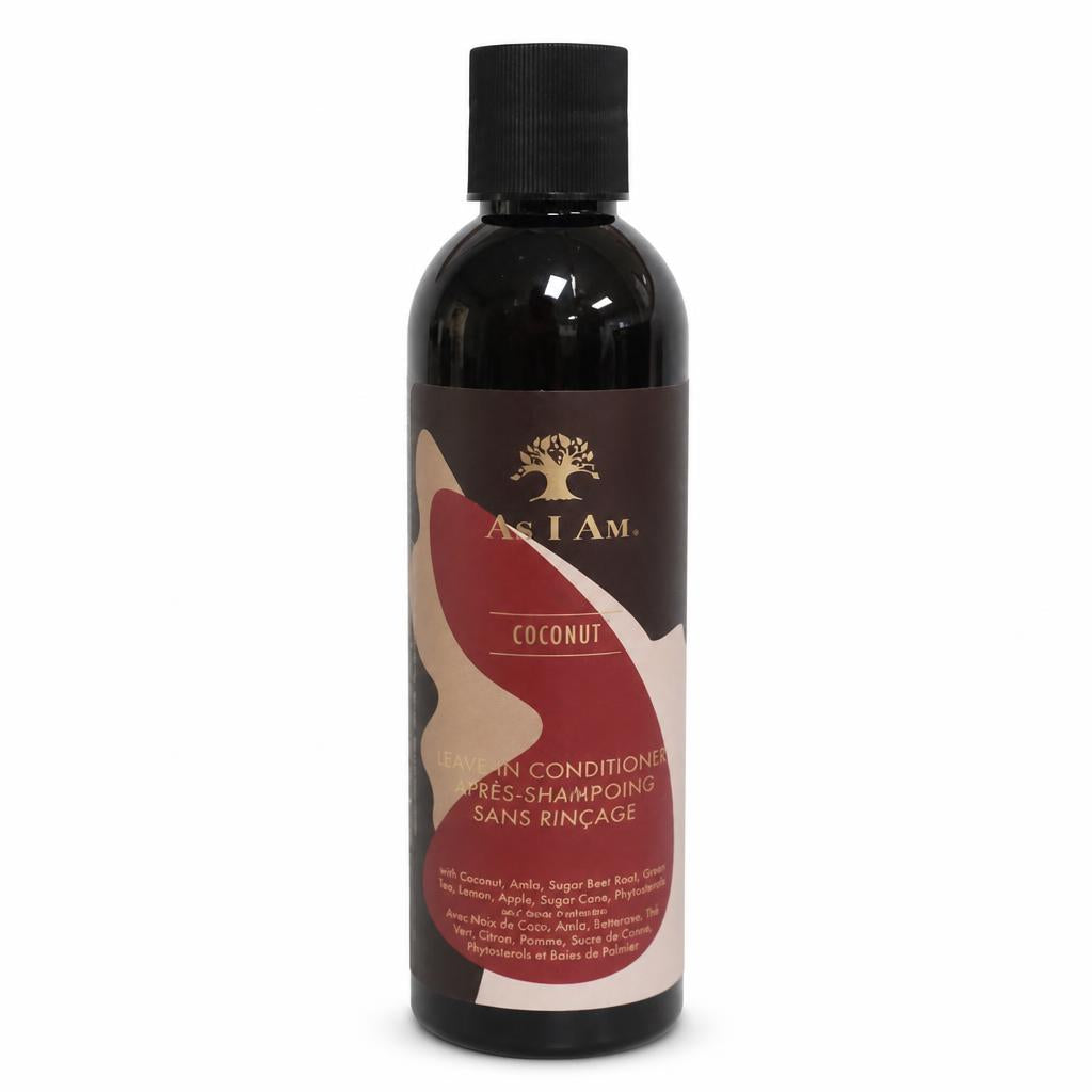 A bottle of As I Am Coconut Brown Conditioner with a black cap and a dark brown label featuring a red and beige graphic design, set against a plain white background.